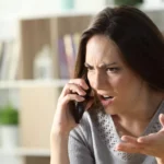 0_Angry-woman-calling-arguing-on-phone-at-home