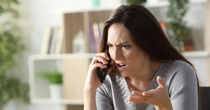 0_Angry-woman-calling-arguing-on-phone-at-home