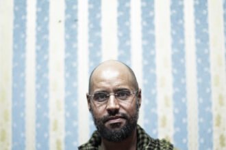 03int-Qaddafi-fwlt-mediumSquareAt3X