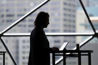 Worker-at-laptop-e1772237092841