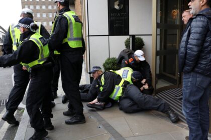 person-is-detained-on-the-day-of-a-static-protest-to-mark-al-Quds-Day