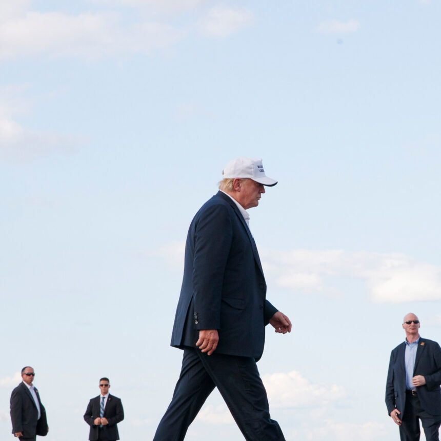 00up-trump-walks1-jwlv-mediumSquareAt3X-1