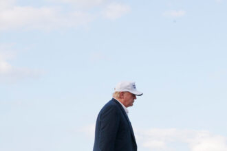 00up-trump-walks1-jwlv-mediumSquareAt3X-2
