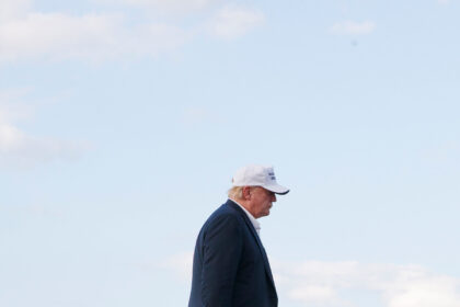 00up-trump-walks1-jwlv-mediumSquareAt3X-2