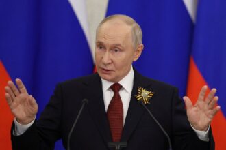 2026-05-09T192647Z_1209160186_RC2U5LAESR2G_RTRMADP_3_WW2-ANNIVERSARY-PUTIN