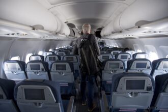 person-getting-on-plane-e1779385401961-18