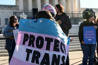 01dc-trans-lawsuit-jbmg-mediumSquareAt3X